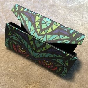 Triangular shaped sun glasses case